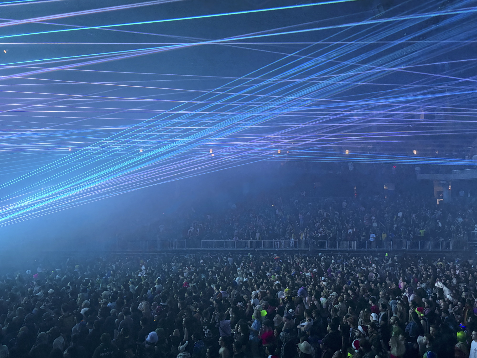 The crowd dances under the lasers of Zeds Dead